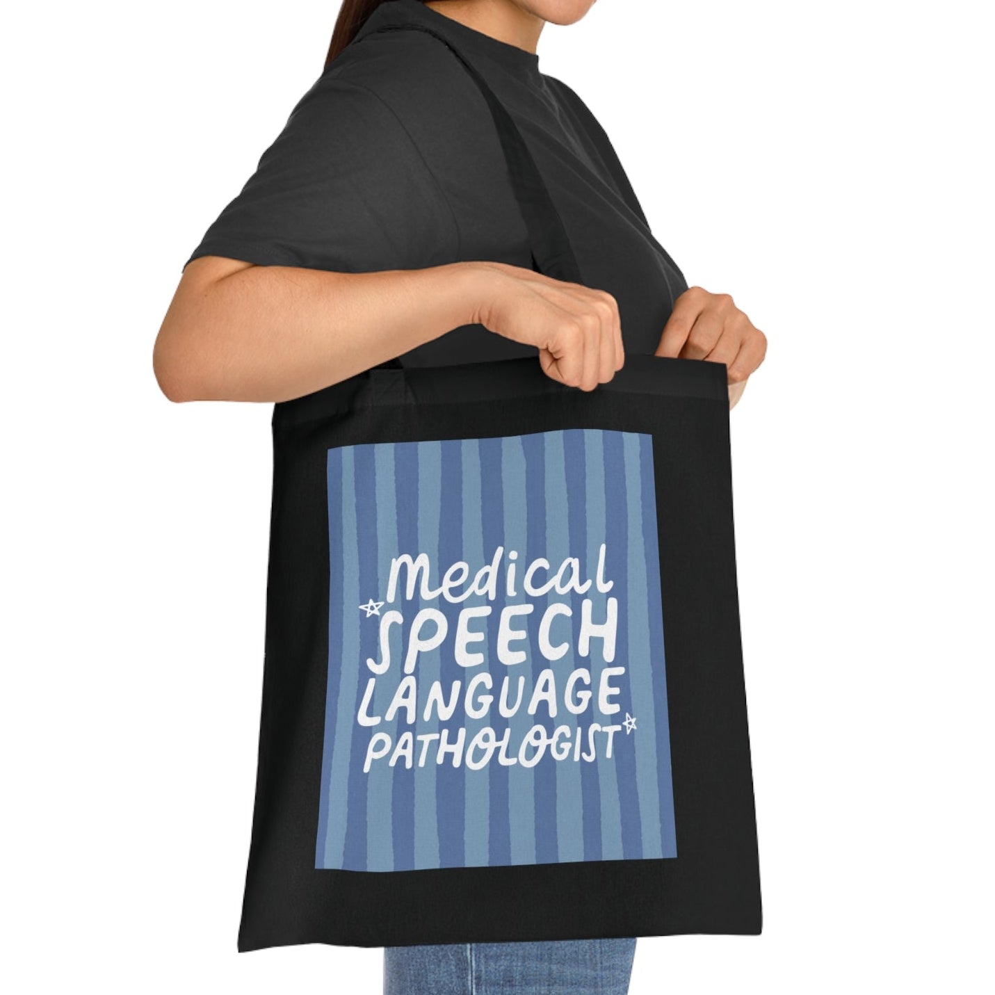 Person holding a black apron with 'Medical Speech Language Pathologist' text on a white background